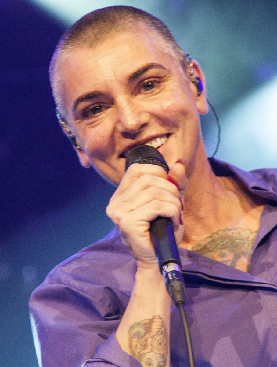 Sinéad O'Connor performing at the Cambridge Folk Festival 50th Anniversary in 2014